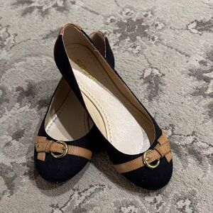 Soda Black Flats with Tan Buckle Trim